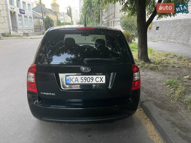 Черный Киа Каренс, объемом двигателя 2 л и пробегом 193 тыс. км за 6400 $, фото 7 на Automoto.ua