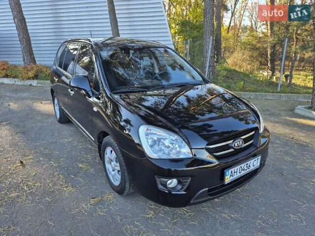 Чорний Кіа Каренс, об'ємом двигуна 2 л та пробігом 88 тис. км за 6450 $, фото 12 на Automoto.ua