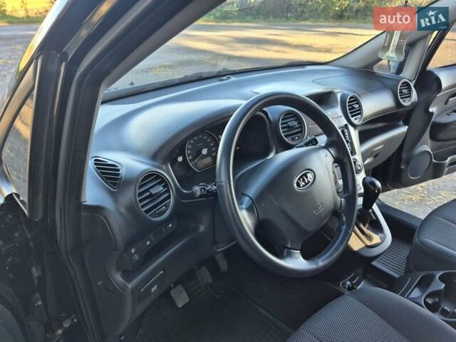 Чорний Кіа Каренс, об'ємом двигуна 2 л та пробігом 88 тис. км за 6450 $, фото 49 на Automoto.ua