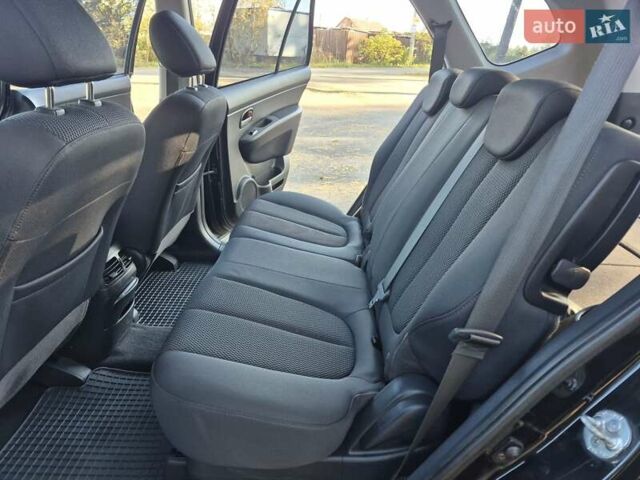 Чорний Кіа Каренс, об'ємом двигуна 2 л та пробігом 88 тис. км за 6450 $, фото 36 на Automoto.ua