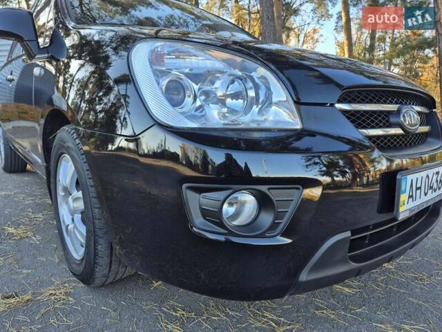 Чорний Кіа Каренс, об'ємом двигуна 2 л та пробігом 88 тис. км за 6450 $, фото 13 на Automoto.ua
