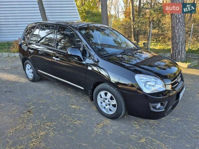 Чорний Кіа Каренс, об'ємом двигуна 2 л та пробігом 88 тис. км за 6450 $, фото 34 на Automoto.ua