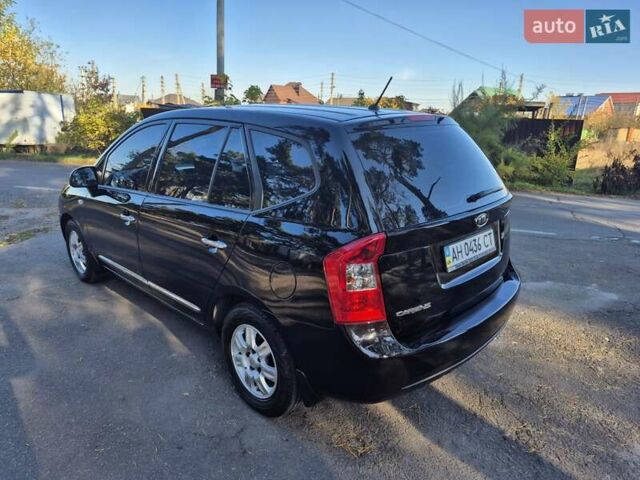 Чорний Кіа Каренс, об'ємом двигуна 2 л та пробігом 88 тис. км за 6450 $, фото 6 на Automoto.ua