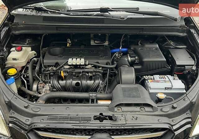 Чорний Кіа Каренс, об'ємом двигуна 2 л та пробігом 207 тис. км за 6500 $, фото 8 на Automoto.ua