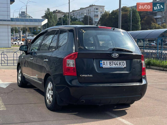 Черный Киа Каренс, объемом двигателя 2 л и пробегом 311 тыс. км за 6700 $, фото 5 на Automoto.ua
