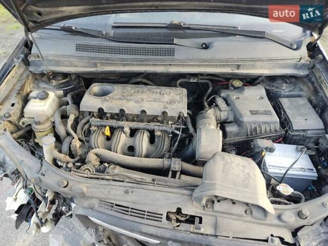 Черный Киа Каренс, объемом двигателя 2 л и пробегом 340 тыс. км за 3000 $, фото 3 на Automoto.ua