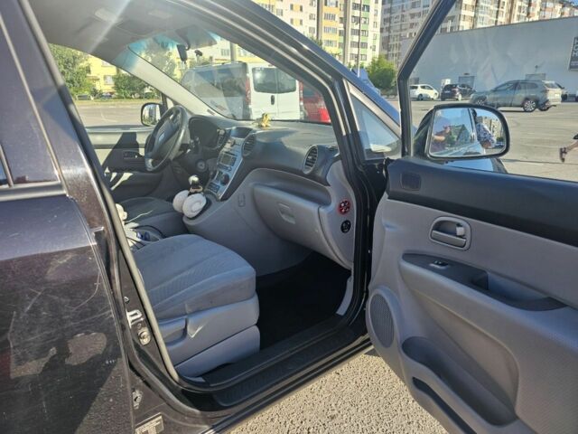 Черный Киа Каренс, объемом двигателя 0 л и пробегом 230 тыс. км за 6900 $, фото 5 на Automoto.ua