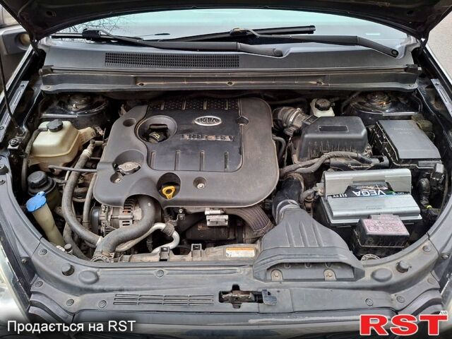 Чорний Кіа Каренс, об'ємом двигуна 2 л та пробігом 228 тис. км за 6500 $, фото 6 на Automoto.ua