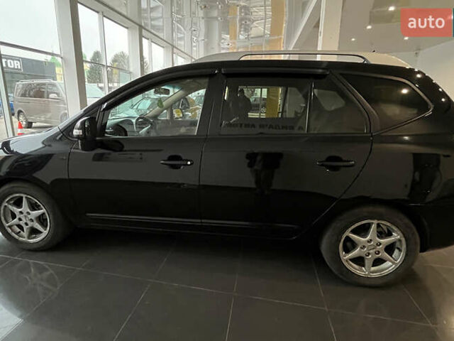 Чорний Кіа Каренс, об'ємом двигуна 1.58 л та пробігом 269 тис. км за 7500 $, фото 3 на Automoto.ua
