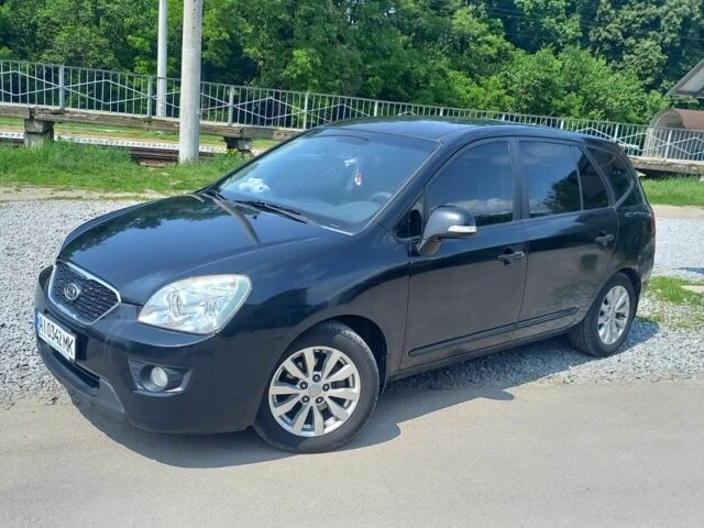 Черный Киа Каренс, объемом двигателя 2 л и пробегом 240 тыс. км за 6750 $, фото 3 на Automoto.ua