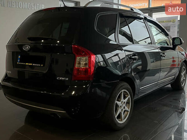 Чорний Кіа Каренс, об'ємом двигуна 1.58 л та пробігом 269 тис. км за 7500 $, фото 6 на Automoto.ua