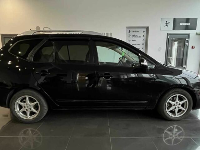 Черный Киа Каренс, объемом двигателя 1.6 л и пробегом 269 тыс. км за 7500 $, фото 7 на Automoto.ua