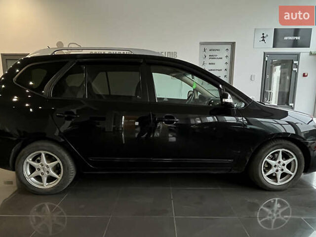 Чорний Кіа Каренс, об'ємом двигуна 1.58 л та пробігом 269 тис. км за 7500 $, фото 7 на Automoto.ua
