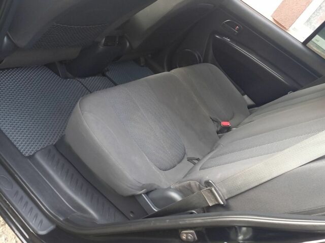 Черный Киа Каренс, объемом двигателя 2 л и пробегом 240 тыс. км за 6750 $, фото 12 на Automoto.ua