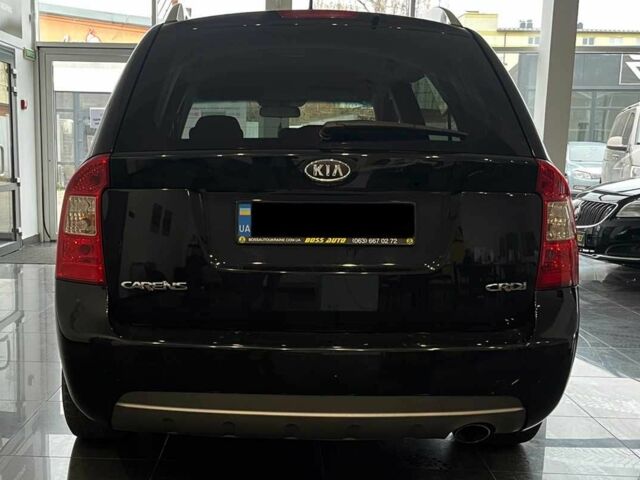 Черный Киа Каренс, объемом двигателя 1.6 л и пробегом 269 тыс. км за 7500 $, фото 5 на Automoto.ua