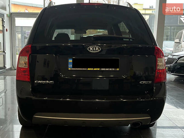 Чорний Кіа Каренс, об'ємом двигуна 1.58 л та пробігом 269 тис. км за 7500 $, фото 5 на Automoto.ua