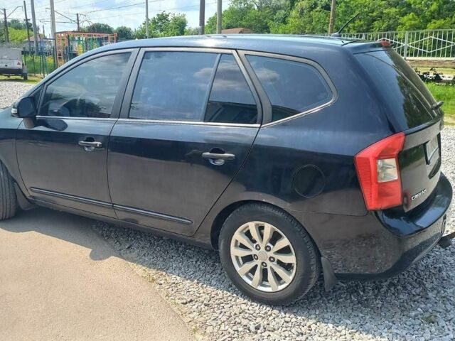 Черный Киа Каренс, объемом двигателя 2 л и пробегом 240 тыс. км за 6750 $, фото 5 на Automoto.ua