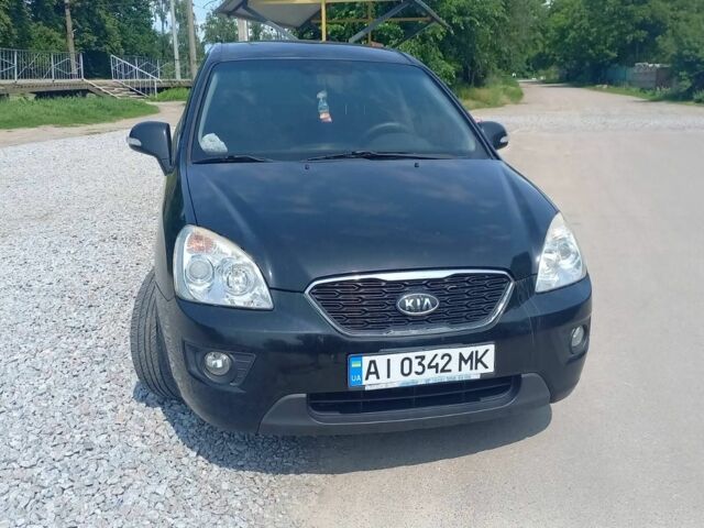 Черный Киа Каренс, объемом двигателя 2 л и пробегом 240 тыс. км за 6750 $, фото 2 на Automoto.ua