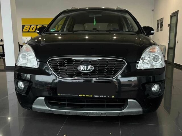 Черный Киа Каренс, объемом двигателя 1.6 л и пробегом 269 тыс. км за 7500 $, фото 1 на Automoto.ua