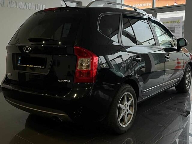 Черный Киа Каренс, объемом двигателя 1.6 л и пробегом 269 тыс. км за 7500 $, фото 6 на Automoto.ua