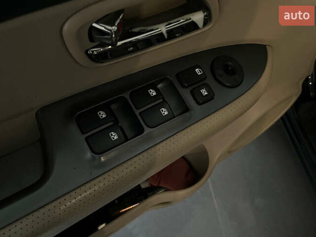 Чорний Кіа Каренс, об'ємом двигуна 1.58 л та пробігом 269 тис. км за 7500 $, фото 16 на Automoto.ua