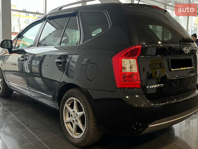 Чорний Кіа Каренс, об'ємом двигуна 1.58 л та пробігом 269 тис. км за 7500 $, фото 4 на Automoto.ua
