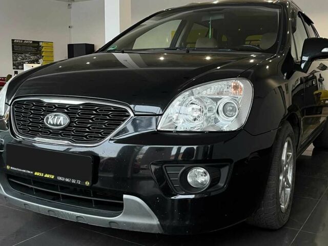 Черный Киа Каренс, объемом двигателя 1.6 л и пробегом 269 тыс. км за 7500 $, фото 2 на Automoto.ua