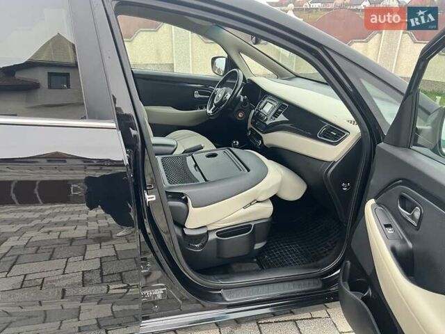 Черный Киа Каренс, объемом двигателя 1.69 л и пробегом 179 тыс. км за 10950 $, фото 144 на Automoto.ua