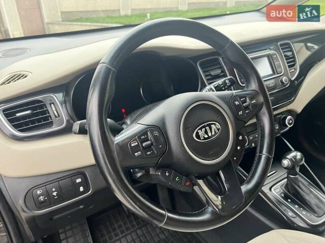 Черный Киа Каренс, объемом двигателя 1.69 л и пробегом 179 тыс. км за 10950 $, фото 72 на Automoto.ua