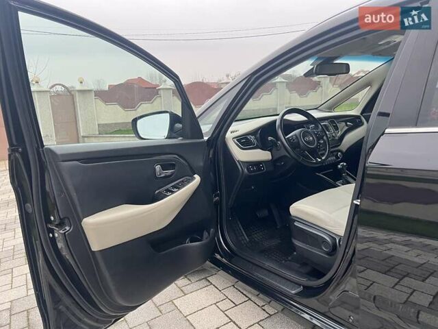 Черный Киа Каренс, объемом двигателя 1.69 л и пробегом 179 тыс. км за 10950 $, фото 122 на Automoto.ua