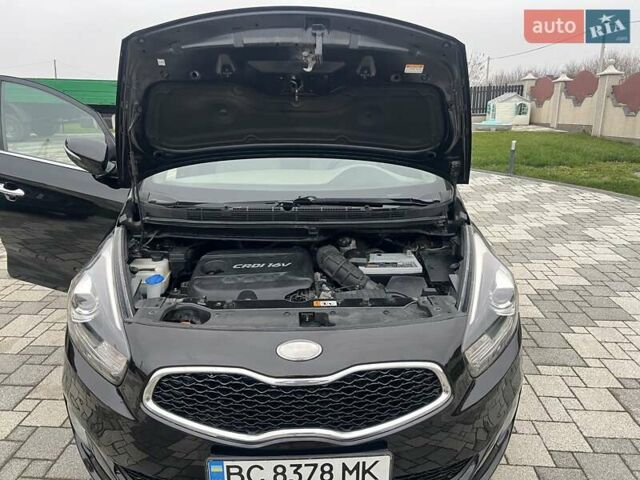 Черный Киа Каренс, объемом двигателя 1.69 л и пробегом 179 тыс. км за 10950 $, фото 166 на Automoto.ua