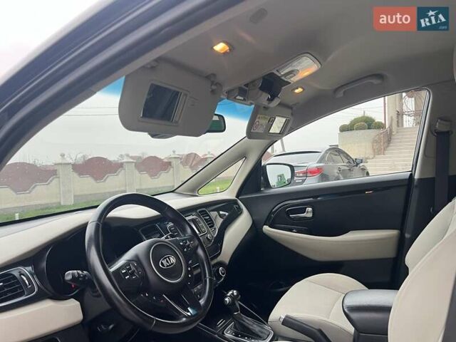 Черный Киа Каренс, объемом двигателя 1.69 л и пробегом 179 тыс. км за 10950 $, фото 69 на Automoto.ua