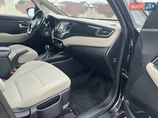 Черный Киа Каренс, объемом двигателя 1.69 л и пробегом 179 тыс. км за 10950 $, фото 94 на Automoto.ua