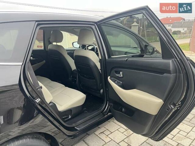 Черный Киа Каренс, объемом двигателя 1.69 л и пробегом 179 тыс. км за 10950 $, фото 100 на Automoto.ua