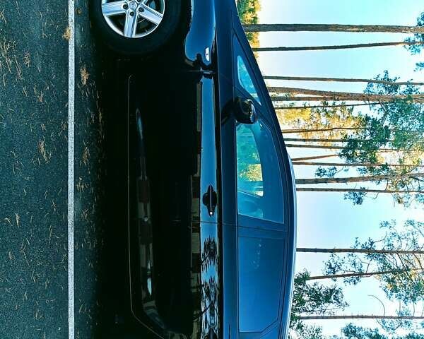 Чорний Кіа Каренс, об'ємом двигуна 1.7 л та пробігом 314 тис. км за 9500 $, фото 7 на Automoto.ua