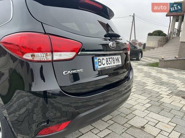 Черный Киа Каренс, объемом двигателя 1.69 л и пробегом 179 тыс. км за 10950 $, фото 161 на Automoto.ua