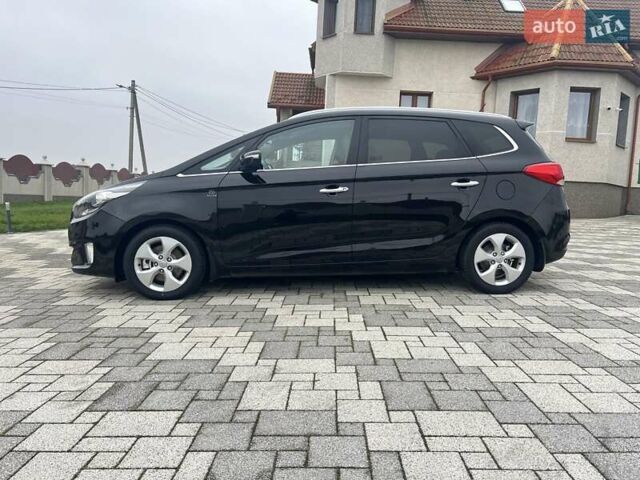 Черный Киа Каренс, объемом двигателя 1.69 л и пробегом 179 тыс. км за 10950 $, фото 42 на Automoto.ua