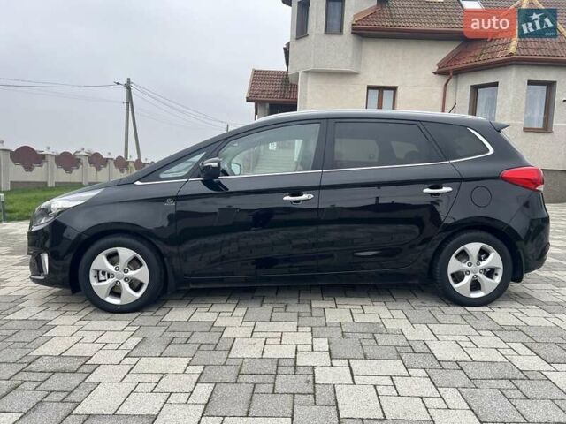 Черный Киа Каренс, объемом двигателя 1.69 л и пробегом 179 тыс. км за 10950 $, фото 40 на Automoto.ua