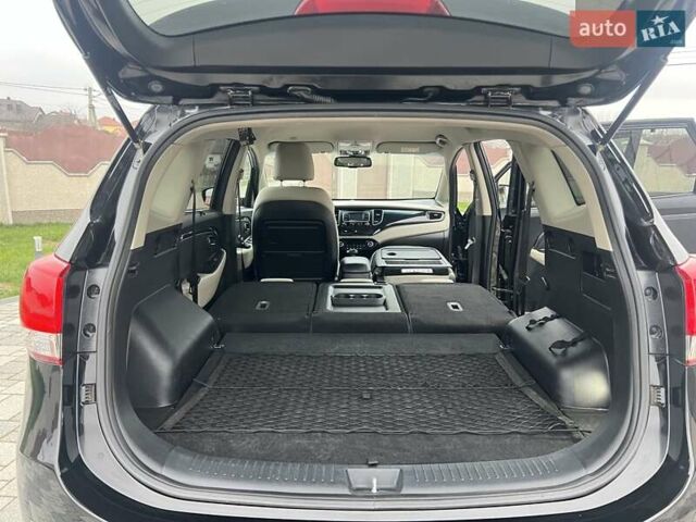 Черный Киа Каренс, объемом двигателя 1.69 л и пробегом 179 тыс. км за 10950 $, фото 149 на Automoto.ua