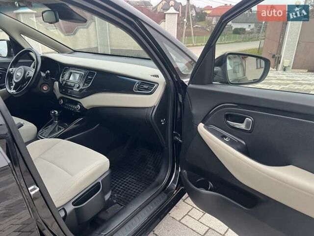 Черный Киа Каренс, объемом двигателя 1.69 л и пробегом 179 тыс. км за 10950 $, фото 90 на Automoto.ua