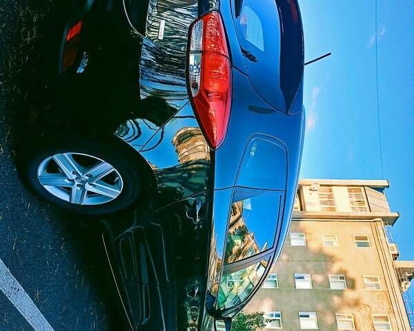 Чорний Кіа Каренс, об'ємом двигуна 1.7 л та пробігом 314 тис. км за 9500 $, фото 6 на Automoto.ua