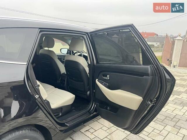 Черный Киа Каренс, объемом двигателя 1.69 л и пробегом 179 тыс. км за 10950 $, фото 97 на Automoto.ua