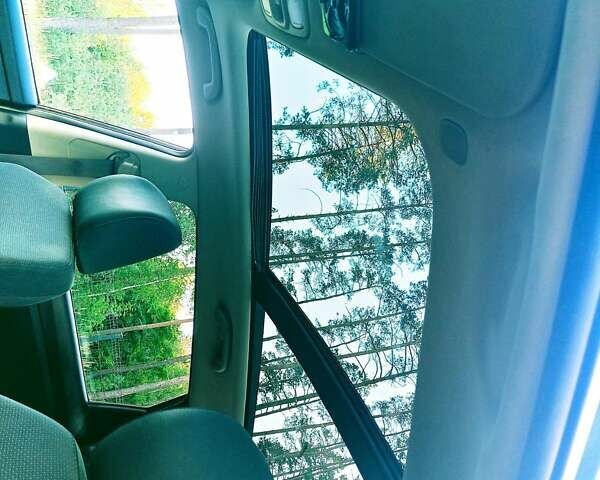 Чорний Кіа Каренс, об'ємом двигуна 1.7 л та пробігом 314 тис. км за 9500 $, фото 12 на Automoto.ua