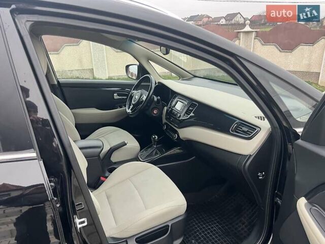 Черный Киа Каренс, объемом двигателя 1.69 л и пробегом 179 тыс. км за 10950 $, фото 85 на Automoto.ua