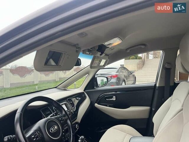 Черный Киа Каренс, объемом двигателя 1.69 л и пробегом 179 тыс. км за 10950 $, фото 66 на Automoto.ua