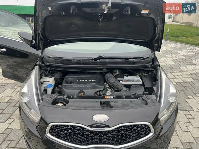 Черный Киа Каренс, объемом двигателя 1.69 л и пробегом 179 тыс. км за 10950 $, фото 167 на Automoto.ua