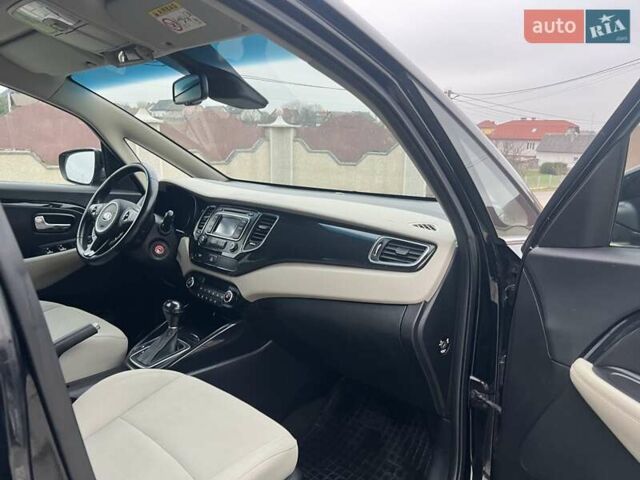 Черный Киа Каренс, объемом двигателя 1.69 л и пробегом 179 тыс. км за 10950 $, фото 92 на Automoto.ua