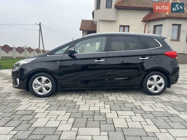 Черный Киа Каренс, объемом двигателя 1.69 л и пробегом 179 тыс. км за 10950 $, фото 43 на Automoto.ua