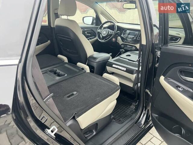 Черный Киа Каренс, объемом двигателя 1.69 л и пробегом 179 тыс. км за 10950 $, фото 146 на Automoto.ua