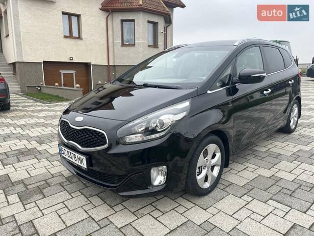 Черный Киа Каренс, объемом двигателя 1.69 л и пробегом 179 тыс. км за 10950 $, фото 52 на Automoto.ua